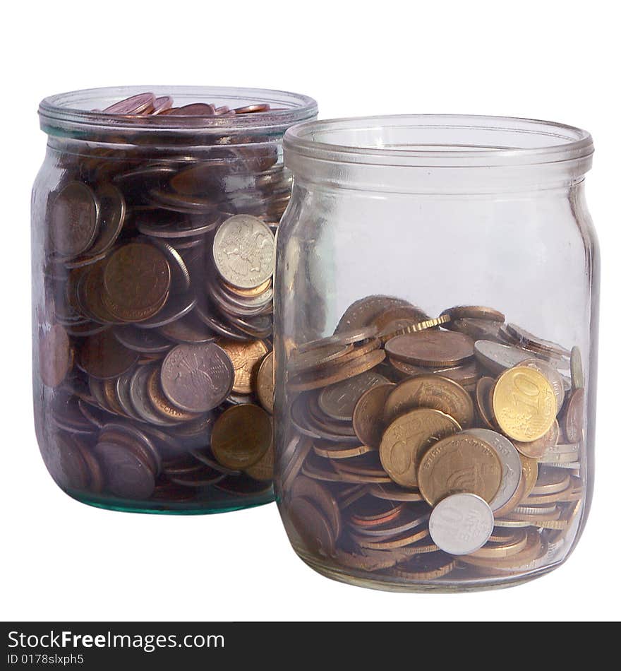 Two jars of different coins. Two jars of different coins.