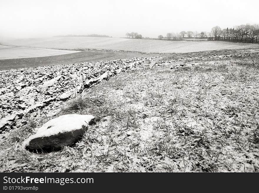 Snowfall Landscape with Stone and Fog. Snowfall Landscape with Stone and Fog