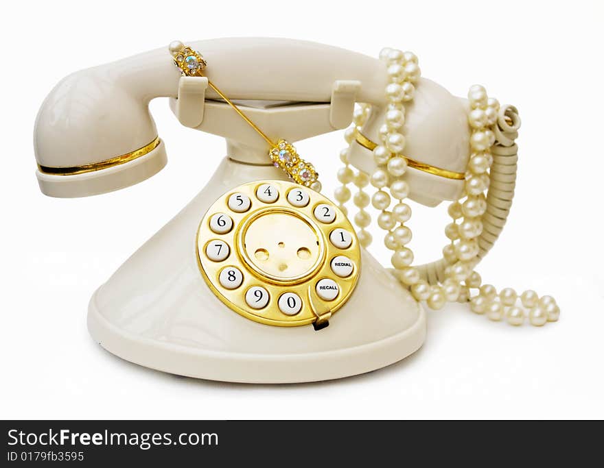 Vintage phone with pearls and clipping path