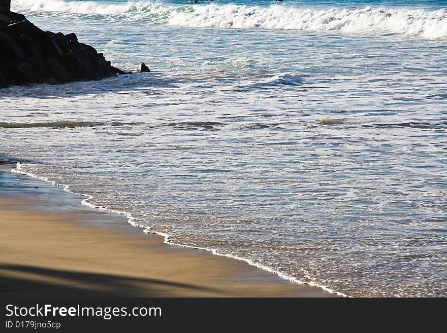 Incoming tide of the Pacific ocean at Miami on the Gold Coast, Queensland Australia. Incoming tide of the Pacific ocean at Miami on the Gold Coast, Queensland Australia