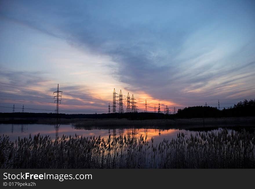 Electric mains on the sunset.
Evening on the lake.