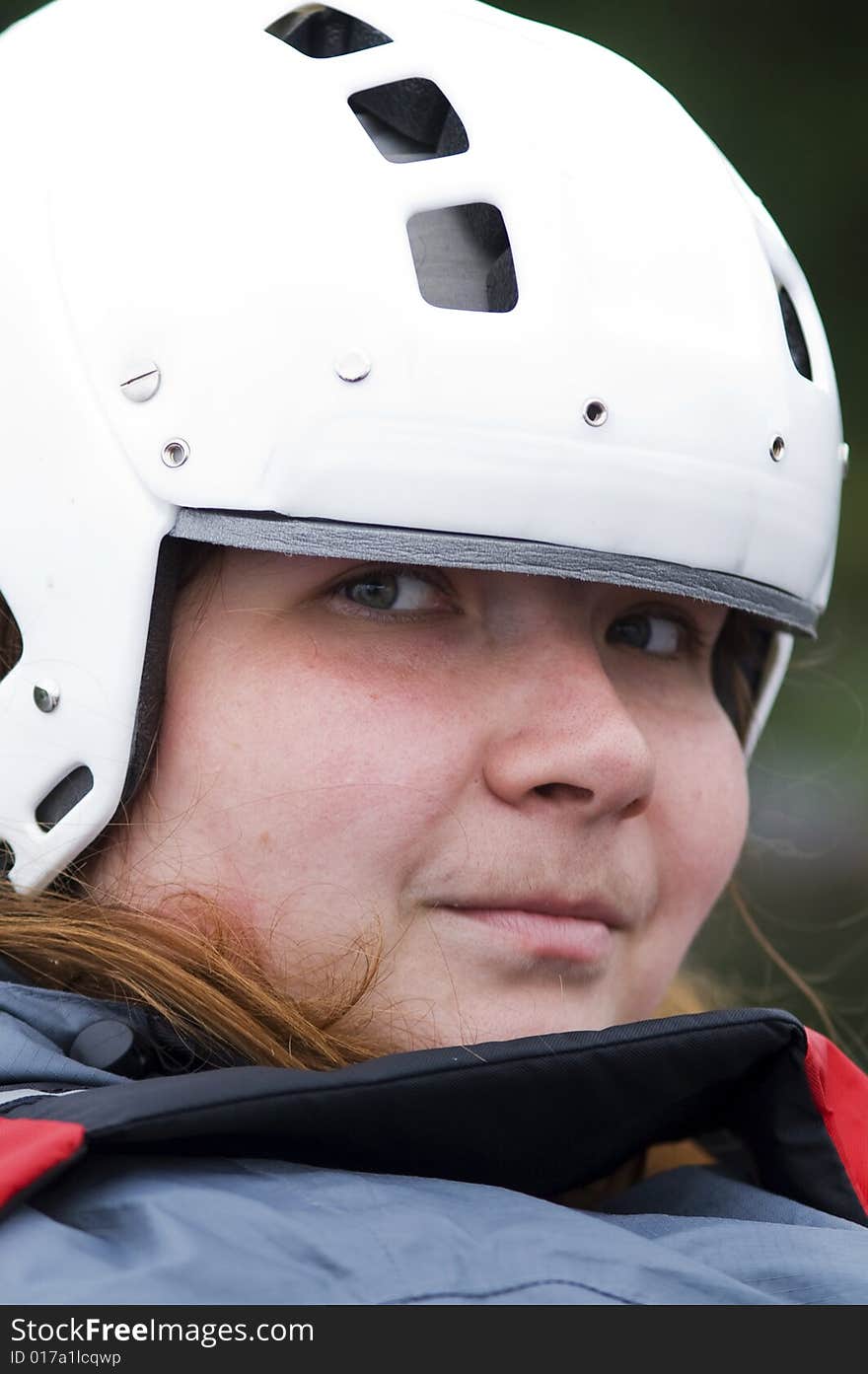 Portrait Of Woman-sportsmen In White Helmet