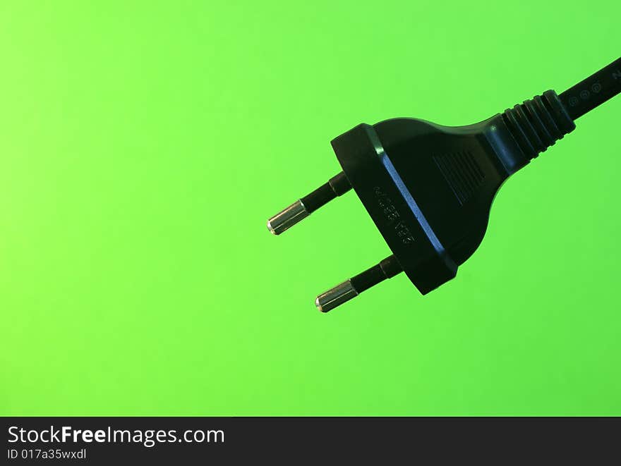 An electricity fuse adaptor in a simple green background