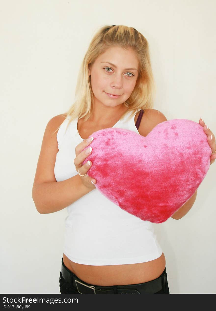 Beautiful woman with a big red heart day happy valentines. Beautiful woman with a big red heart day happy valentines