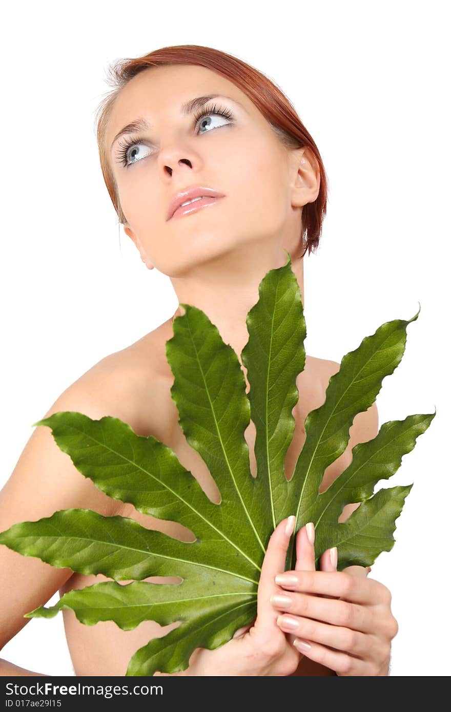 Young girl with green leaf. Young girl with green leaf