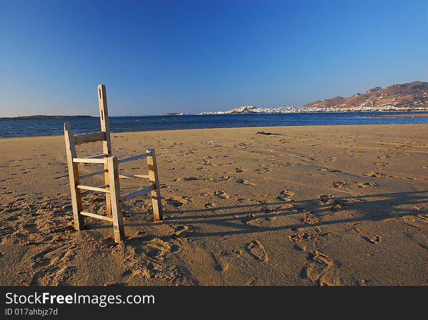 Old chair...abandoned in a desert beach. Old chair...abandoned in a desert beach..