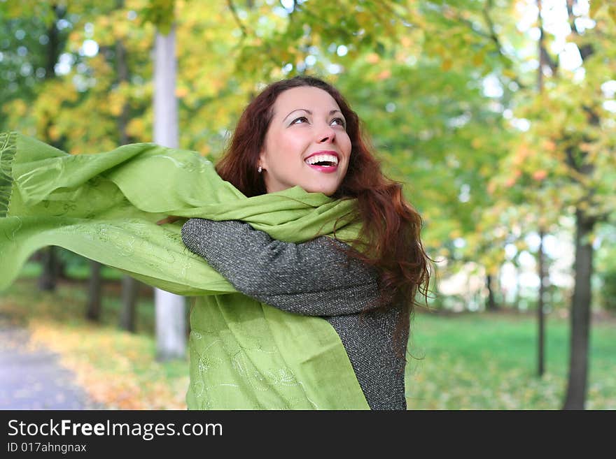 Young girl walking in park. Young girl walking in park