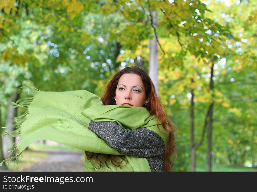 Young girl walking in park. Young girl walking in park