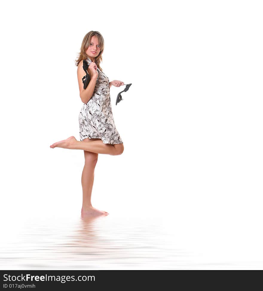 Beautiful young barefooted girl isolated on white background. Beautiful young barefooted girl isolated on white background