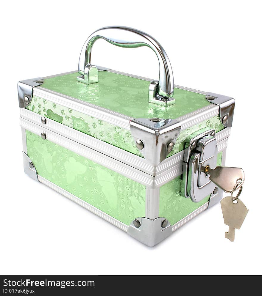 Light green trunk with keys isolated on a white background