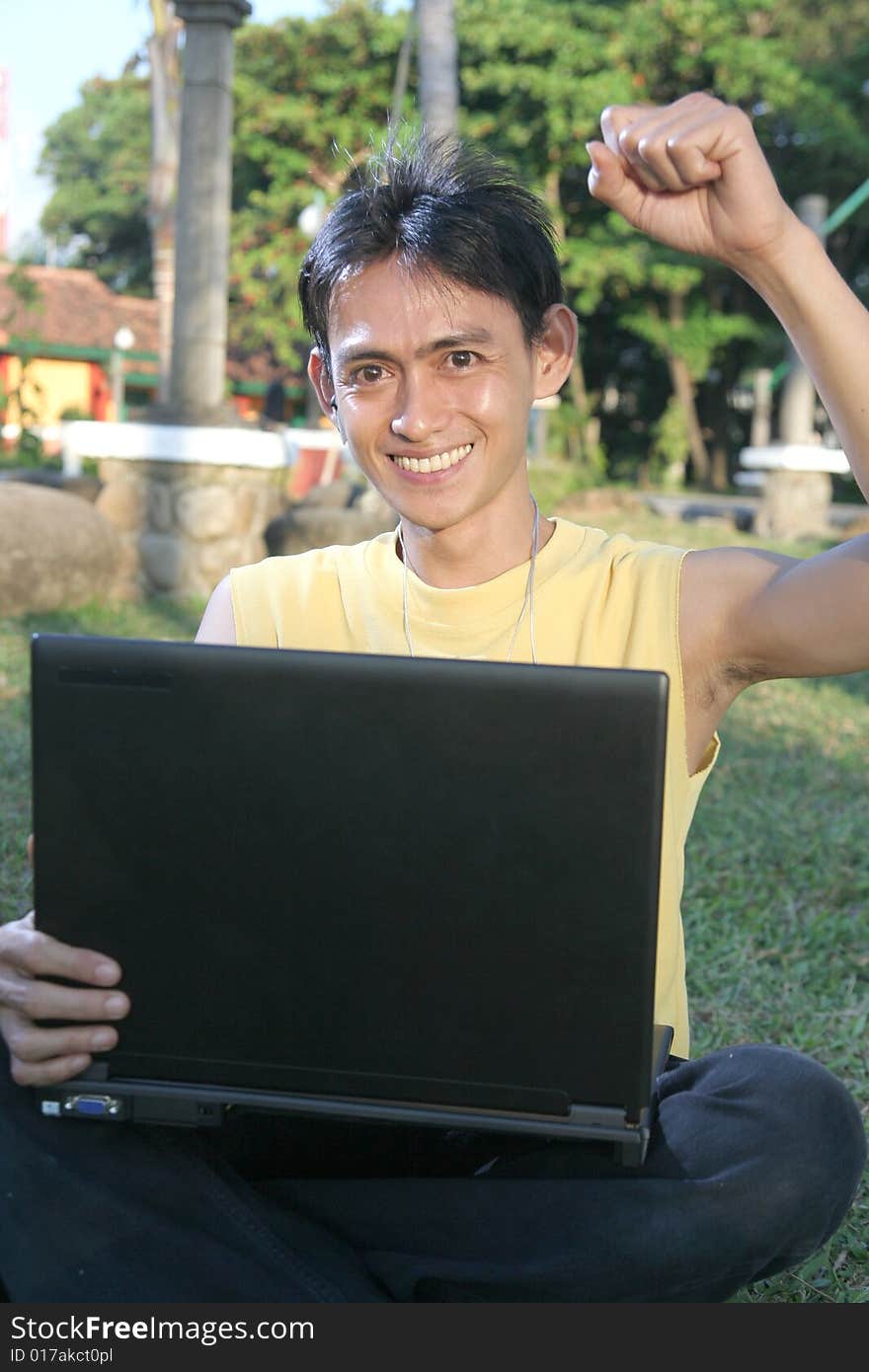 Casual Man Happy On Laptop