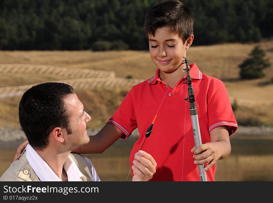 Father with son and free time, adult man teach operation fishing