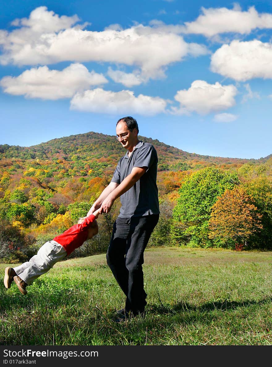 Father playing with son outdoor