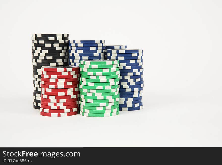 Amount of variable poker chipes isolated on white background. Amount of variable poker chipes isolated on white background