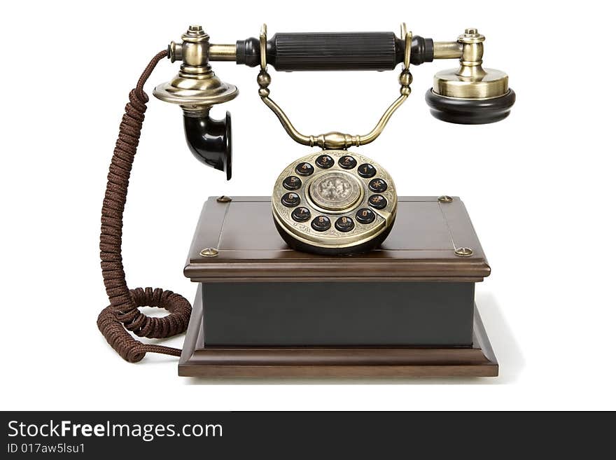 Antique telephone with brown button. Antique telephone with brown button