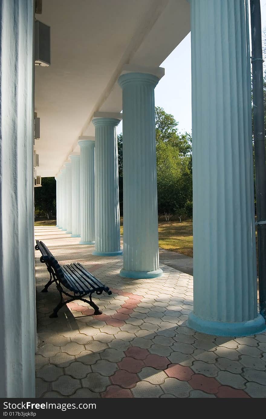 Bench among columns. Old church. Bench among columns. Old church