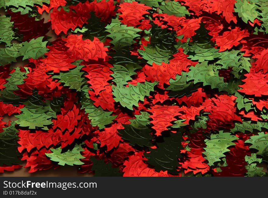 Christmas background from green and red christmastrees