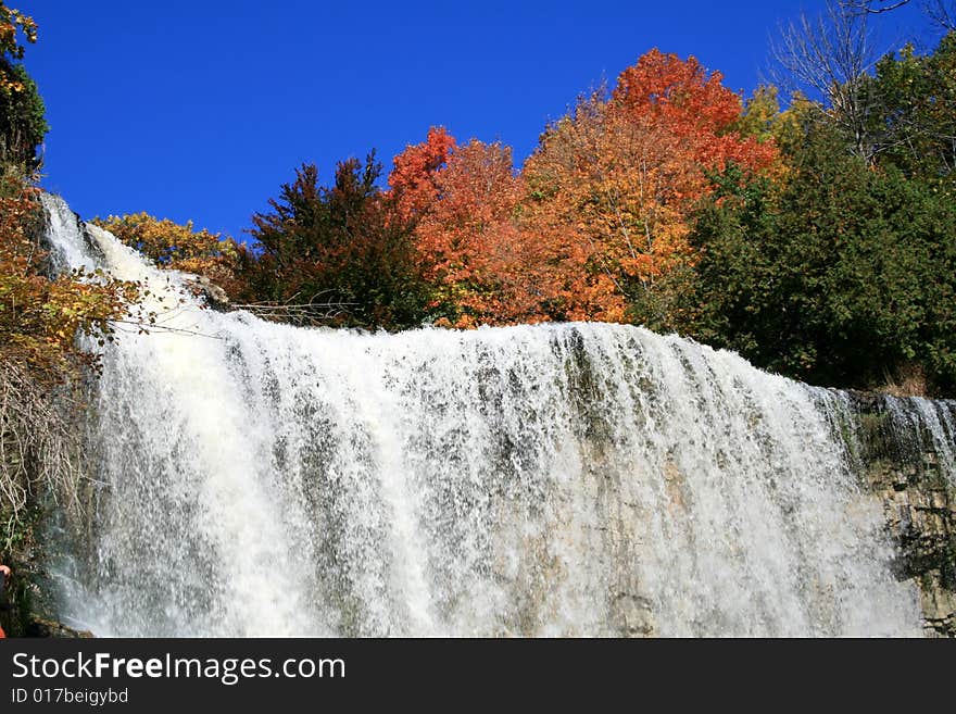 Waterfall At Autumn