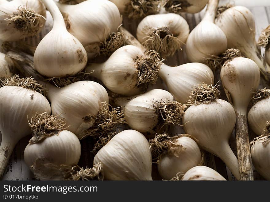 Heap of fresh garlic background