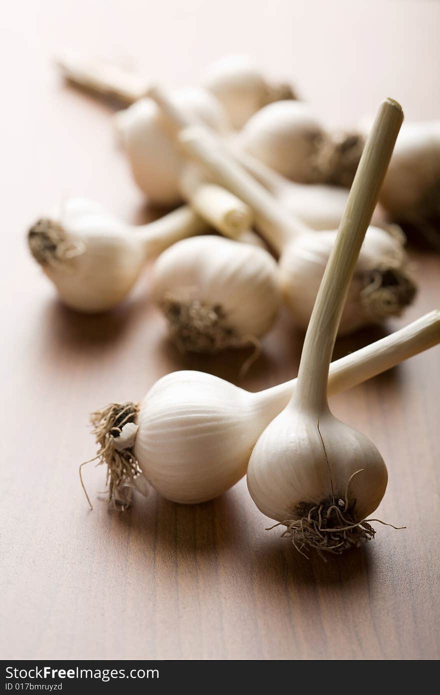 Fresh garlic background (shallow focus)