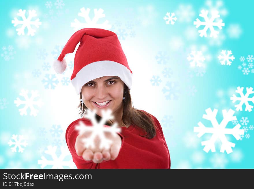 Santa woman holding small snowflake in the hand over blue background