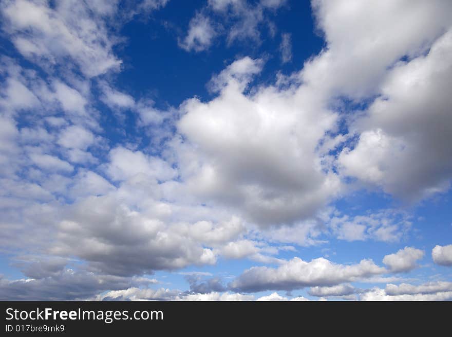 Cumulus clouds and blue sky