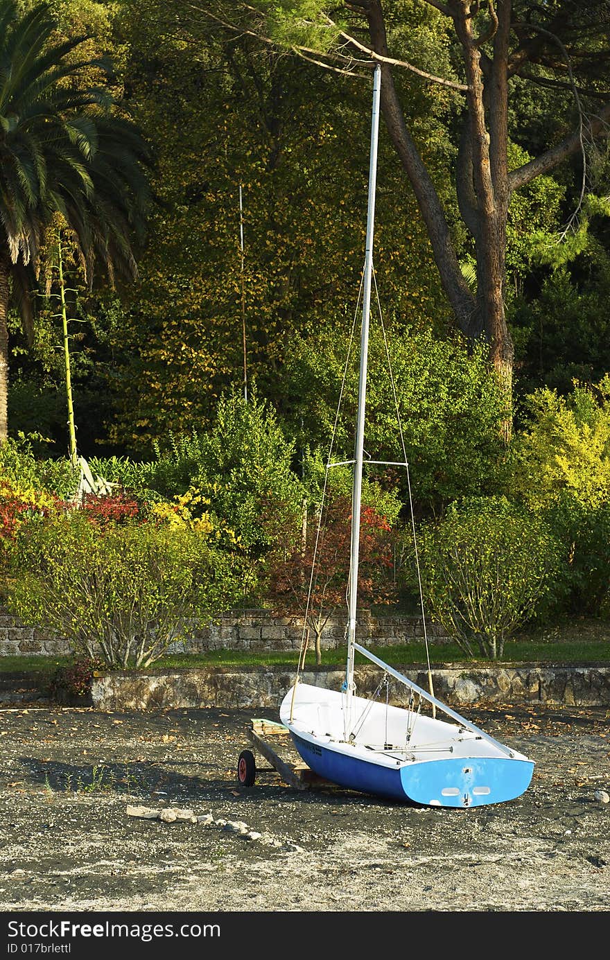 A Boat standing on a river, waiting springtime. A Boat standing on a river, waiting springtime