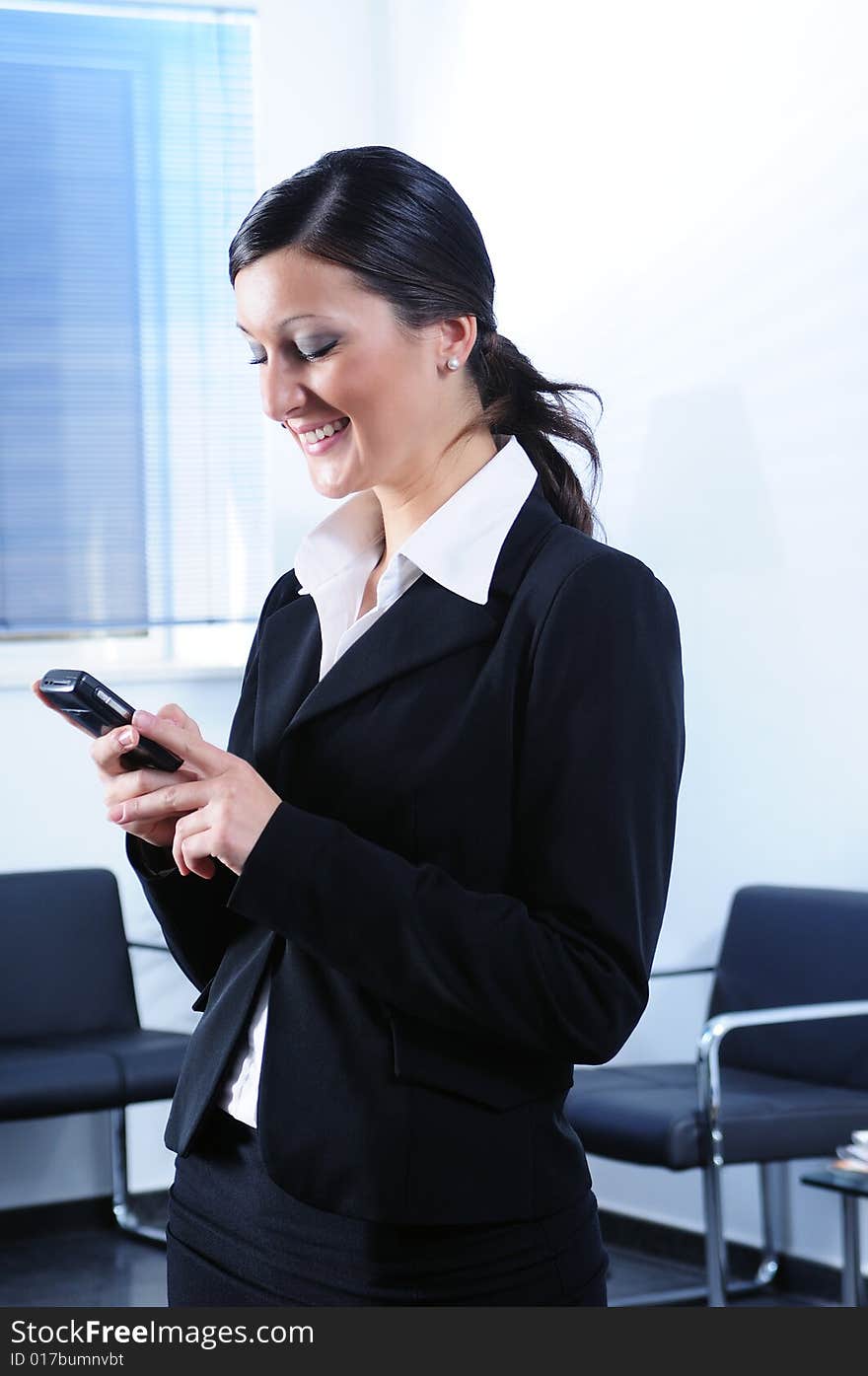 smiling woman with telephone