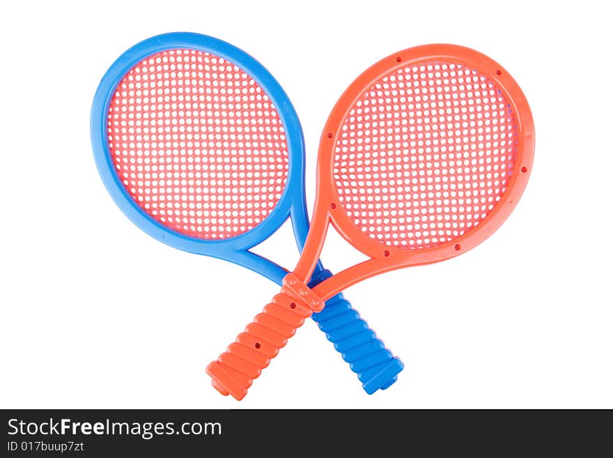 Pair of plastic rackets on white