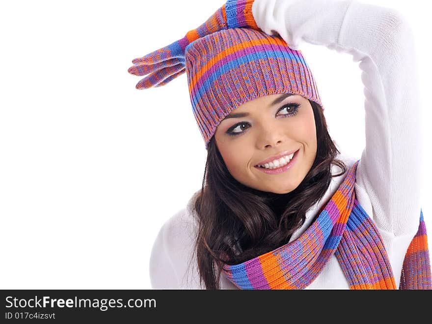 Sexual girl in a multicolor hat and gloves. Winter fashion. Sexual girl in a multicolor hat and gloves. Winter fashion.