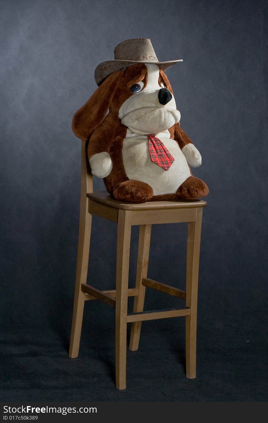 Wooden lacquered chair and toy with western hat