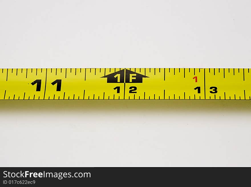 A measuring tape with isolated two inch segment. A measuring tape with isolated two inch segment