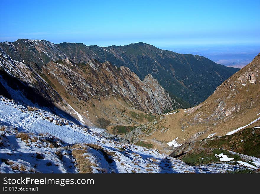 Alpine valley of Podragu, in Fagaras mountains (Southern Carpathian Ridge) in Romania. Alpine valley of Podragu, in Fagaras mountains (Southern Carpathian Ridge) in Romania.