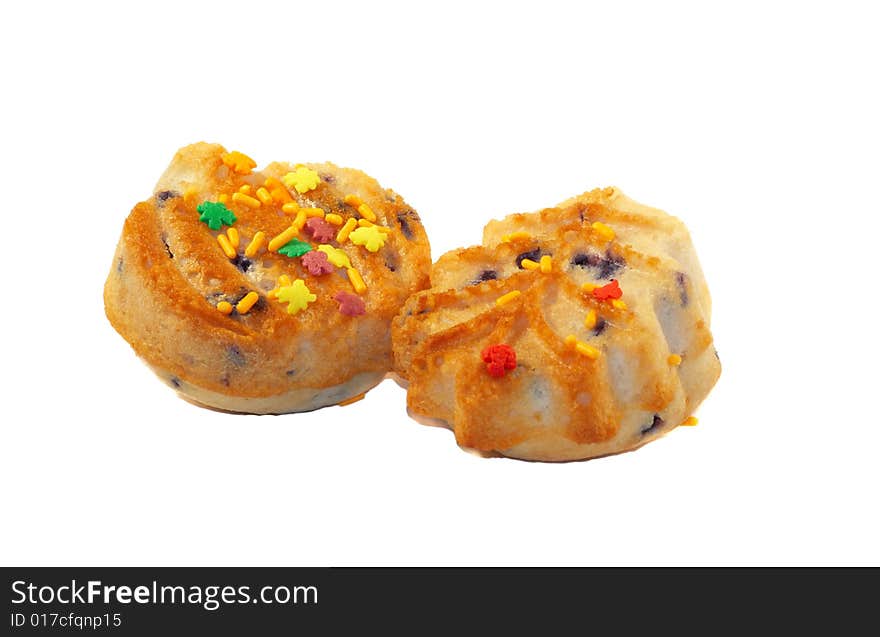 Two isolated handmade fruit-cakes for party. Two isolated handmade fruit-cakes for party.