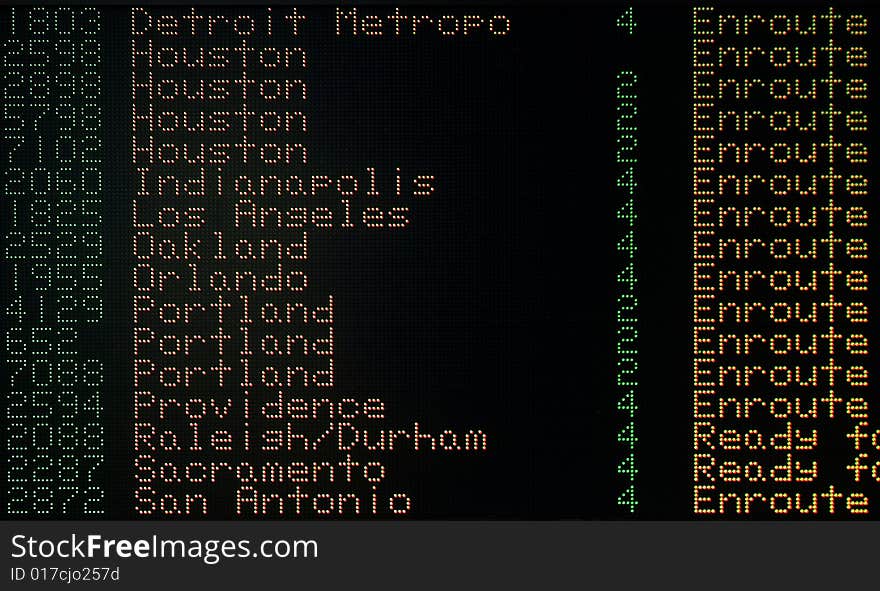 Airport arrival information listed in terminal lounge