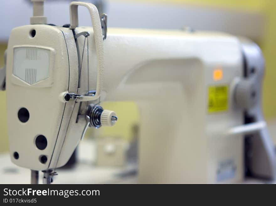 A sewing machine and on a table