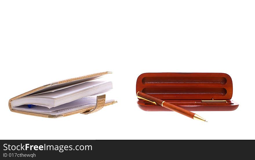 Photo, with a pen and notebook cases for pen on a white background. Photo, with a pen and notebook cases for pen on a white background.