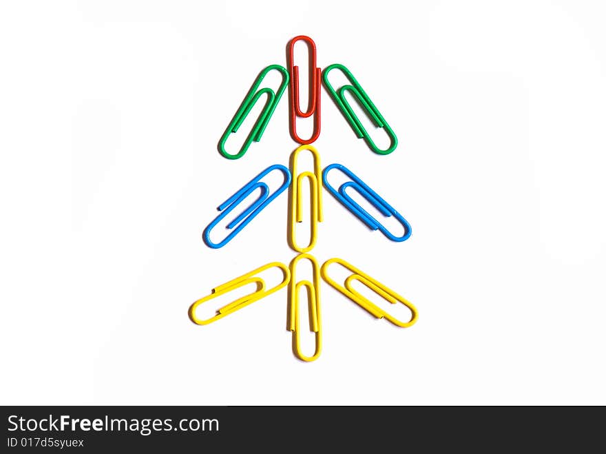 Paper clips in different figures on a white background