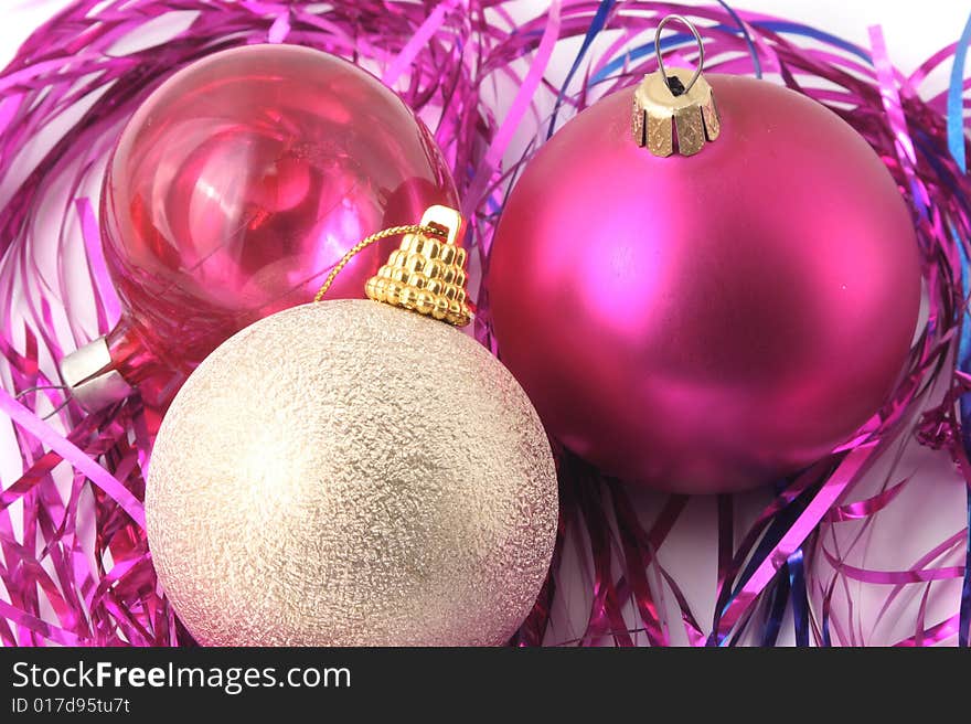 Christmas-tree decorations of different color and tinsel.