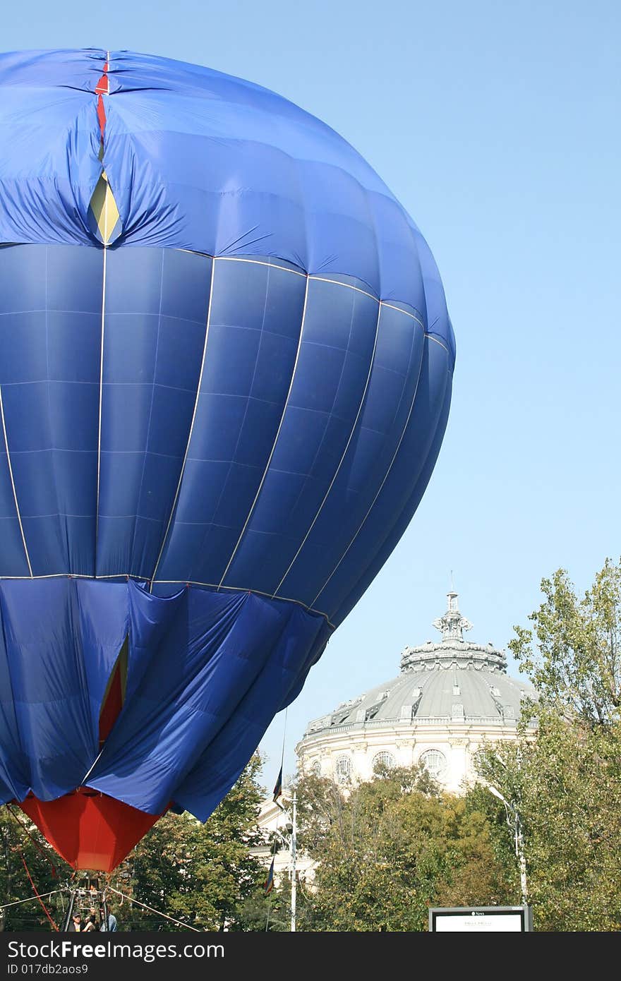 Advertising balloon raising up in the city