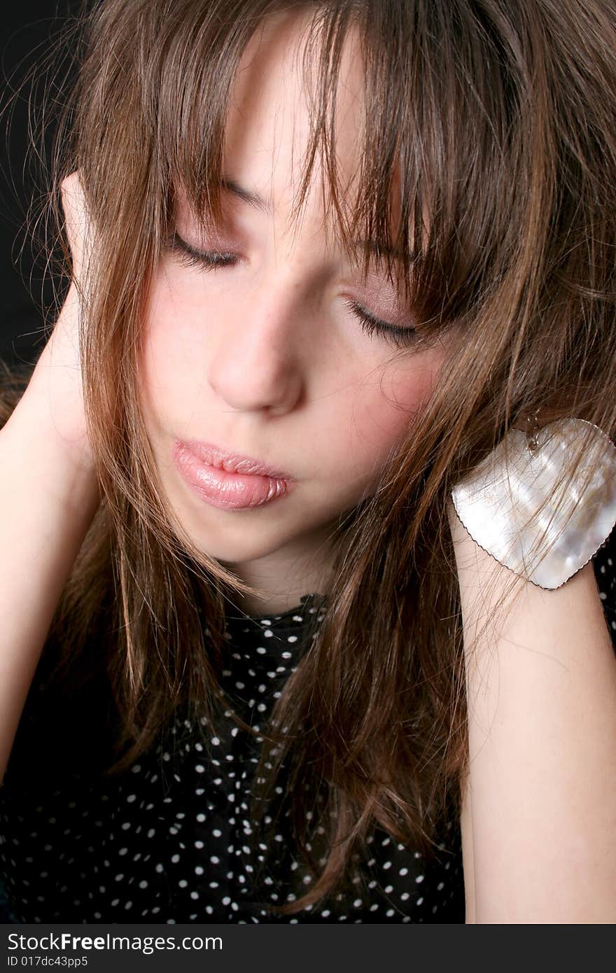 Close up of a teen model with closed eyes. Close up of a teen model with closed eyes