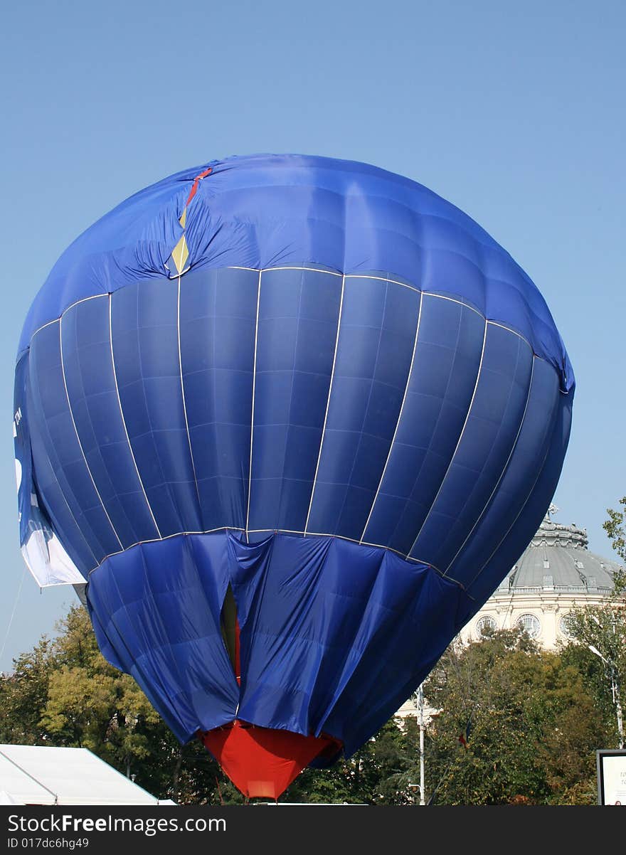 Advertising balloon raising up in the city