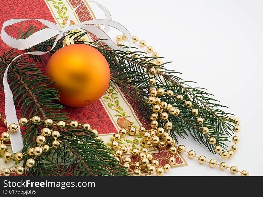 Yellow ball with ribbon on the white background. Yellow ball with ribbon on the white background