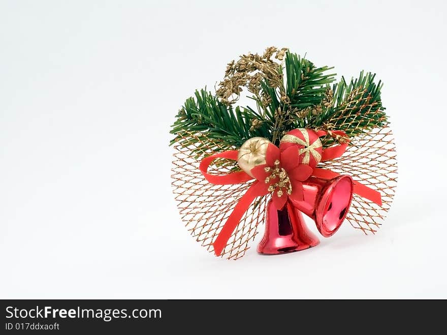 Two red christmas bells with ribbon