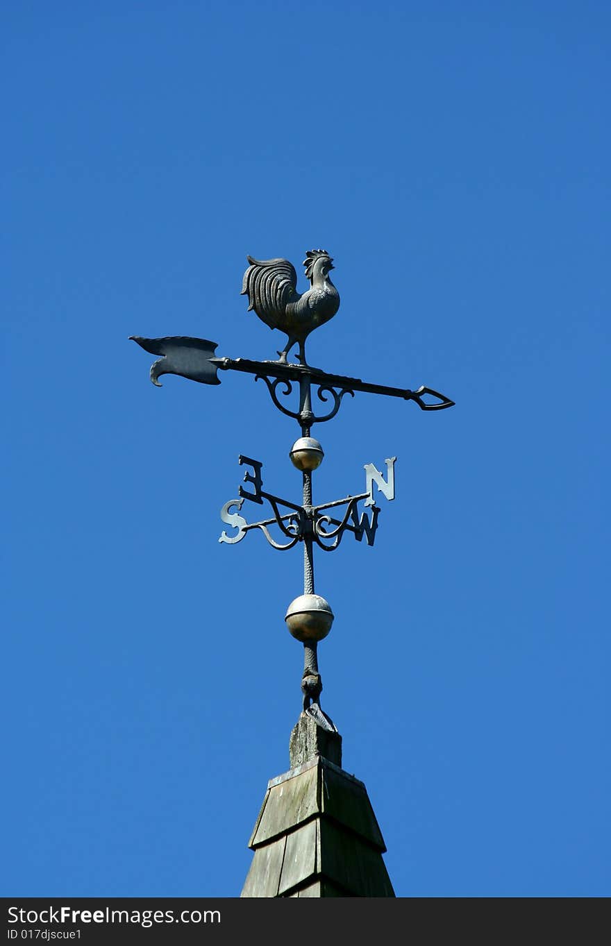 Old Historic Roof With Weather Vane