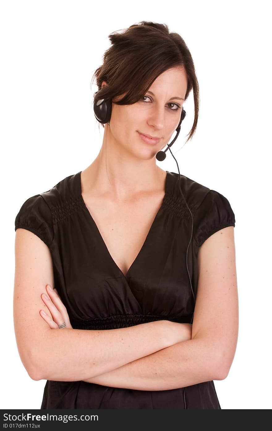 Young Caucasian brunette woman with headset, arms crossed. Isolated on white background. Young Caucasian brunette woman with headset, arms crossed. Isolated on white background