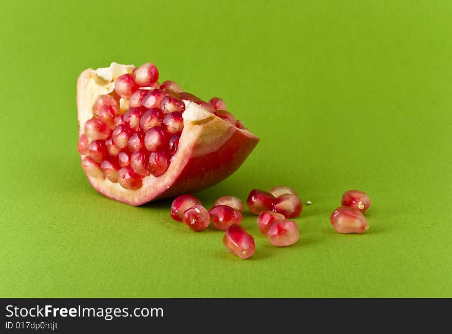 Pomegranate close-up isolated on white background