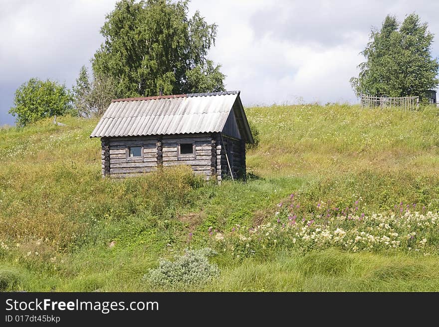 Rural house in the green field