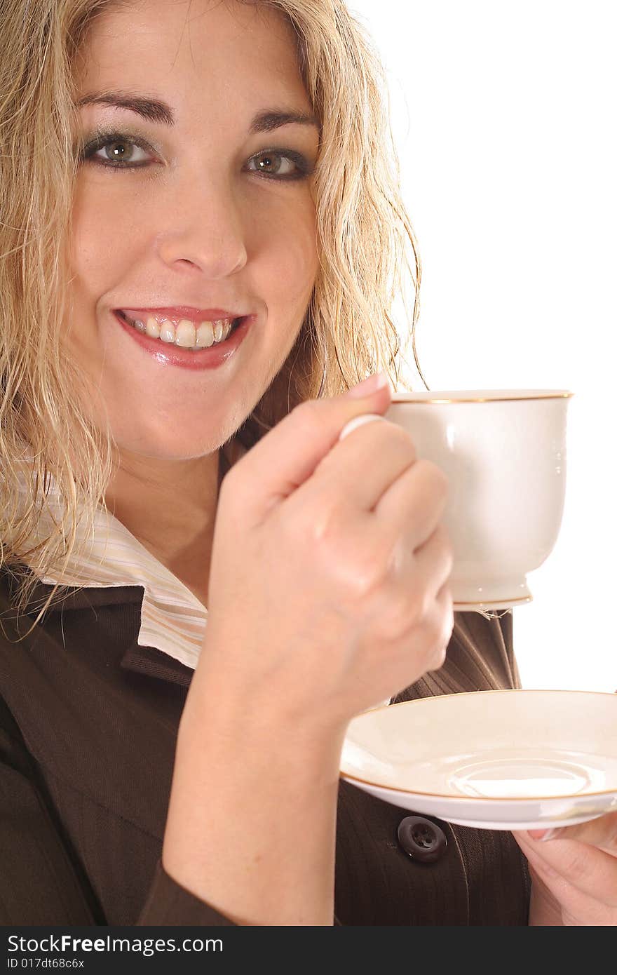 Woman having a cup of tea isolated on white