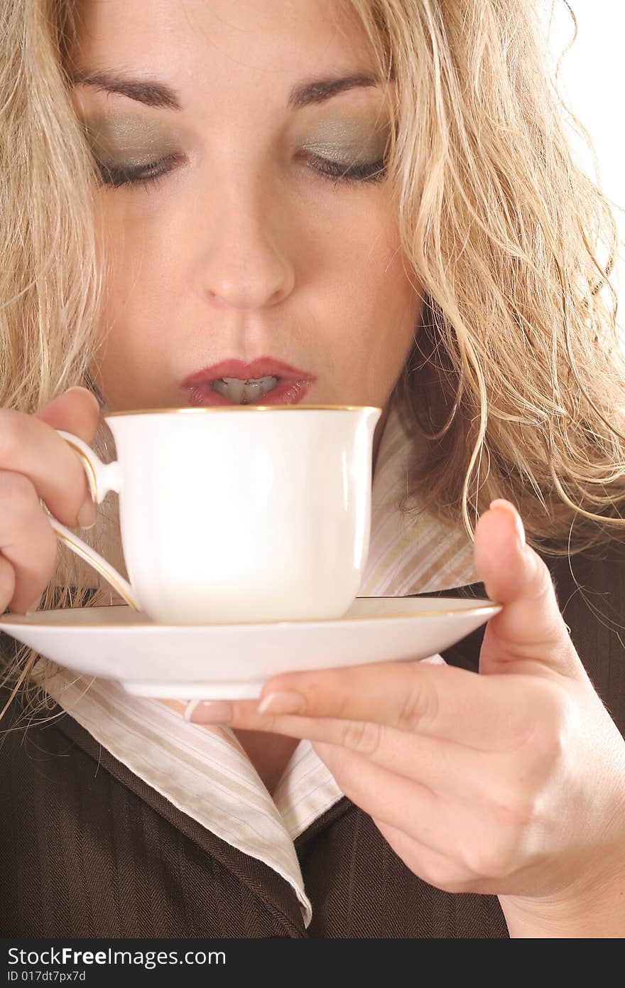 Sexy woman sipping coffee